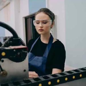 Woman wearing goggles while working