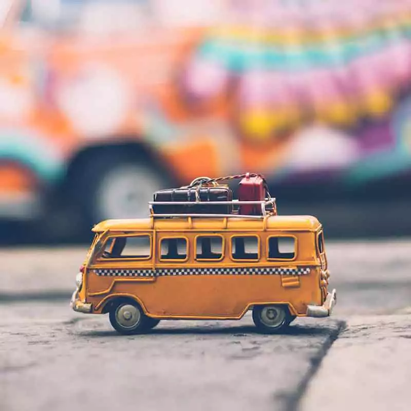 A yellow bus toy